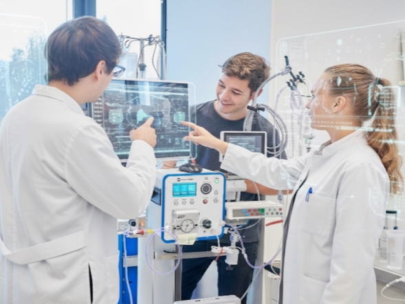 Three researchers in the lab