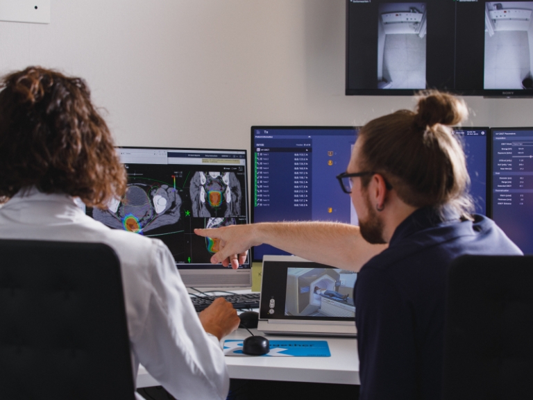 Use of data science and artificial intelligence in adaptive radiotherapy for a patient with recurrent carcinoma in the small pelvis
